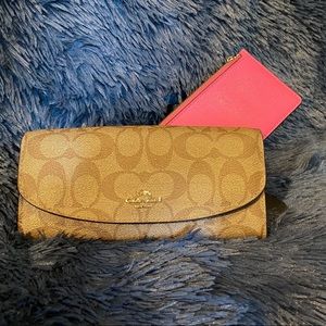 Coach wallet with extra zipper pouch